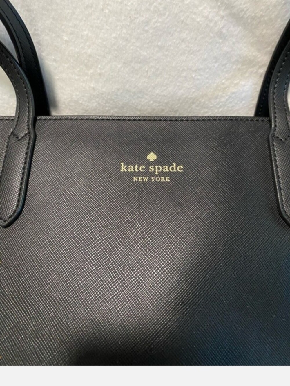 Kate Spade black saffiano leather tote with gold logo